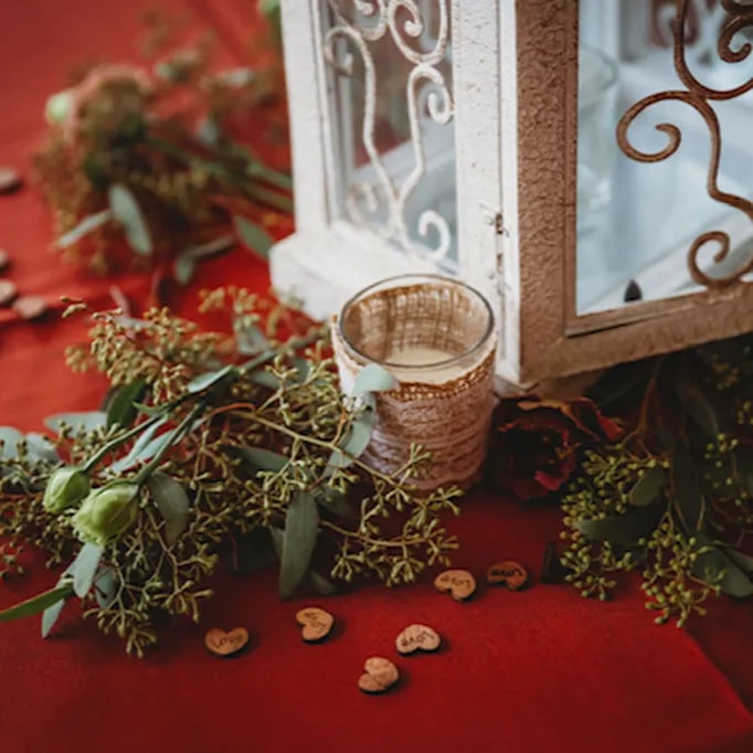 Create a warm and inviting ambiance with textural eucalyptus & candles.