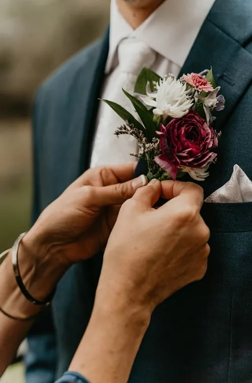 A Boutonniere by Poppy Flowers