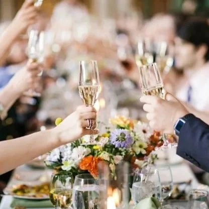 Wedding reception tablescape with floral centerpieces